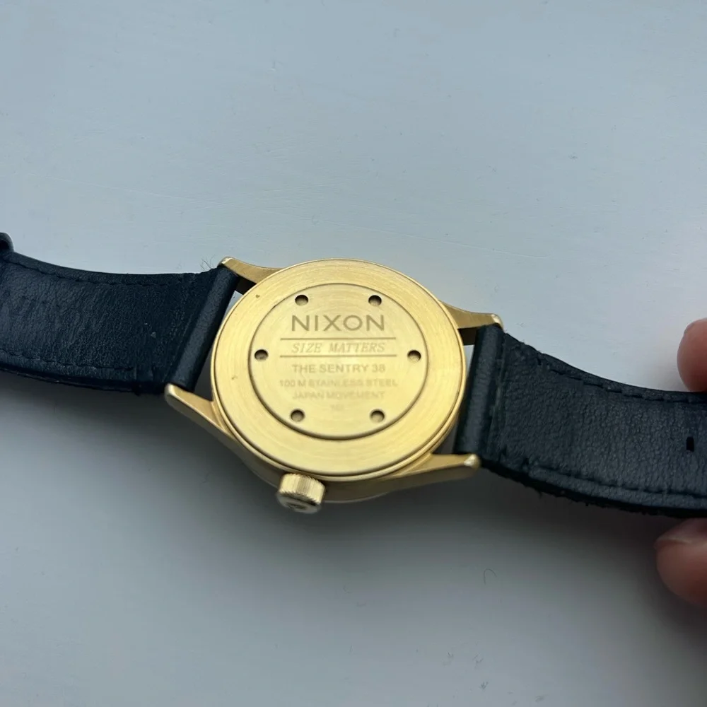 Nixon Gold-Tone Case with Black Leather Strap Watch
